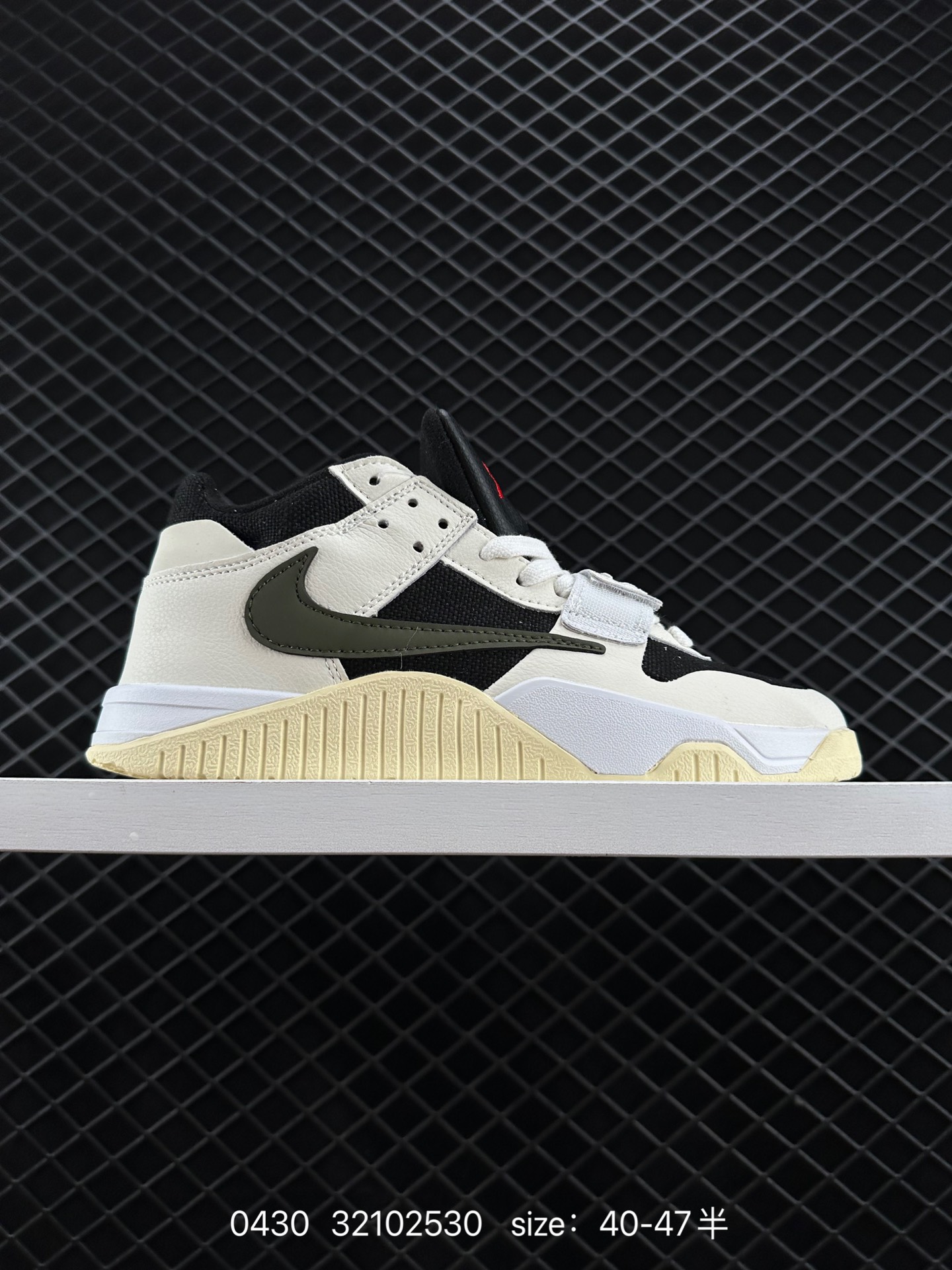 Travis Scott x Air Jordan Executive The Check